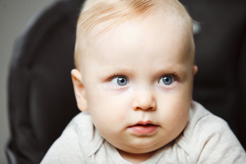 Sweet baby with amazed look and wide open eyes royalty free stock photo Sweet baby with amazed look and wide open eyes royalty free stock photo