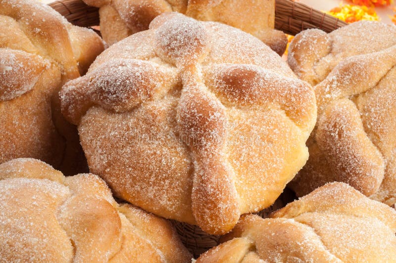 Premium Photo  Three pieces of pan de muerto. day of the dead