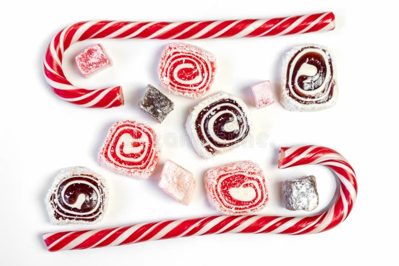 Sweet candy background. Red and maroon candies on white background. Top view stock photography Sweet candy background. Red and maroon candies on white background. Top view stock photography