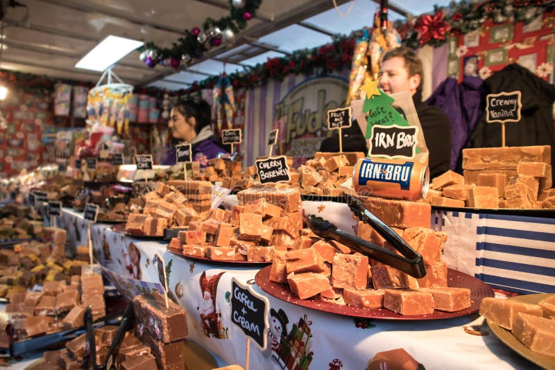 Sweet confection fudge stand stall vendor displaying Irn Bru fudge in market place setting