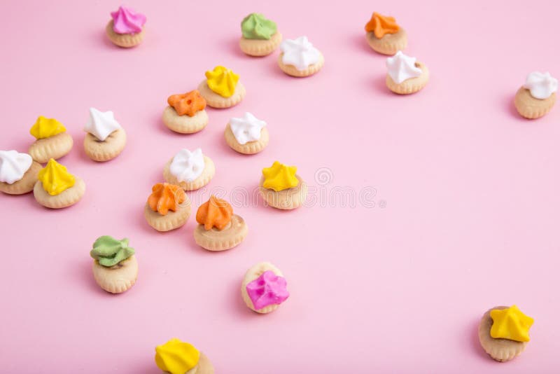 Sweet cookie on pink background.