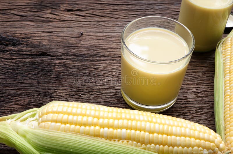 Sweet Corn Juice ,corn Milk and Corn on Wooden Table. Stock Photo ...