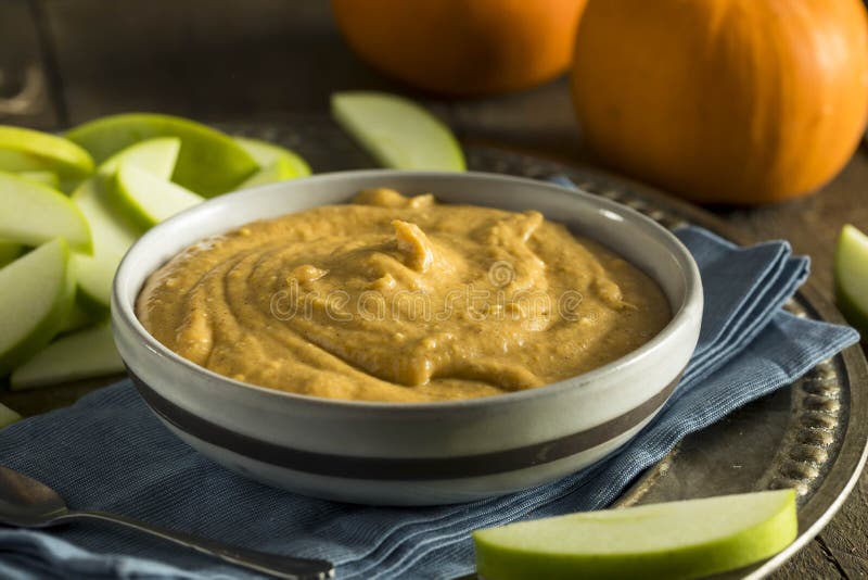 Sweet Dessert Pumpkin Dip. With Apples for Dipping stock photo
