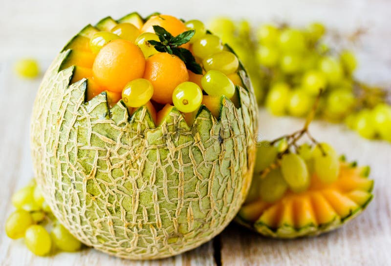 Melon and grapes. stock photo. Image of berry, background 30105434