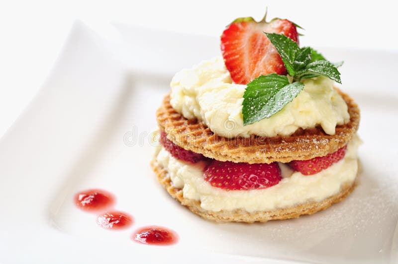 Sweet Dessert Wafers with Vanilla Creme and Strawberries Stock Photo