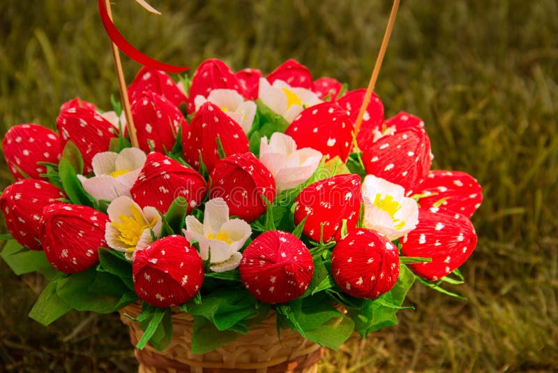 Sweet edible bouquet of sweets in the form of strawberries. Handmade. Gift for St. Valentine`s Day