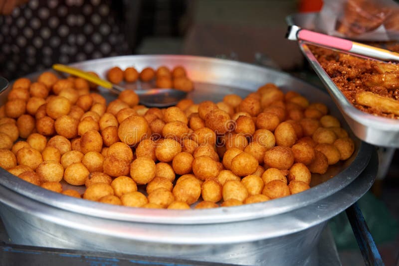 Sweet Fried Potato Balls. Sweets in the Asian Street Food Market Stock ...