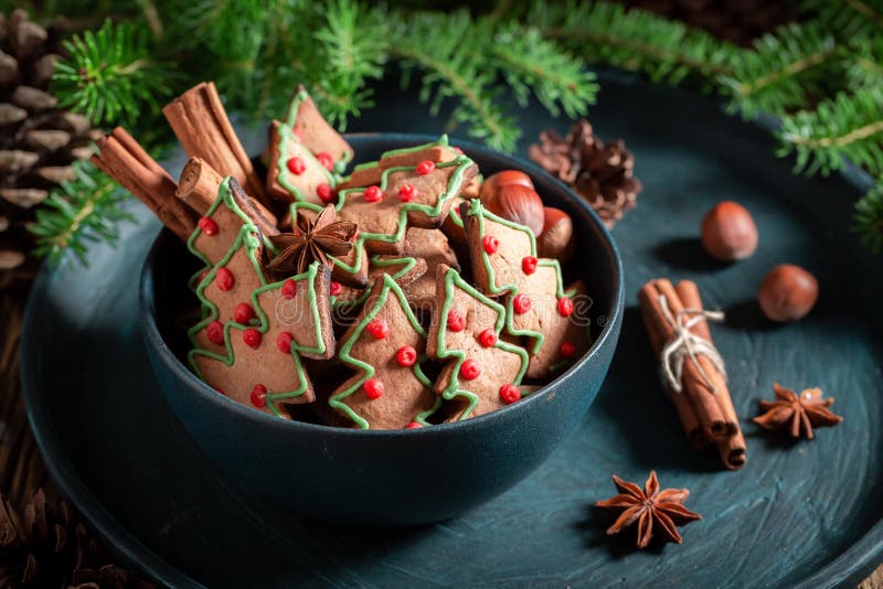 Sweet gingerbread cookies for Christmas on rustic tray stock photos Sweet gingerbread cookies for Christmas on rustic tray stock photos