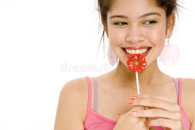 A cute teenage girl in underwear and candy lollipop, Stock Photo