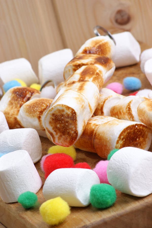 Grilled Marshmallow on Stick. Marshmallow on Skewer Roasted on