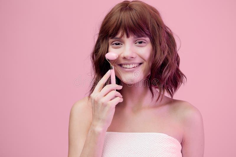 Sweet Happy Woman Standing On A Pink Background With Pink Lighting From The Side With 