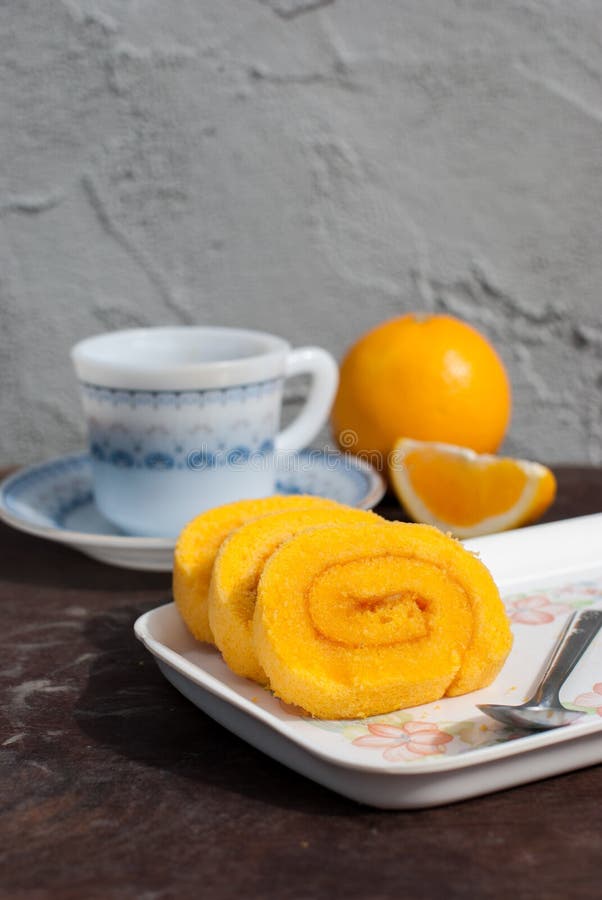 Sweet Orange jam roll cake with coffee