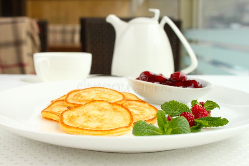 Sweet Pancakes with Cherry Sauce Decorated Stock Photo Image of brown