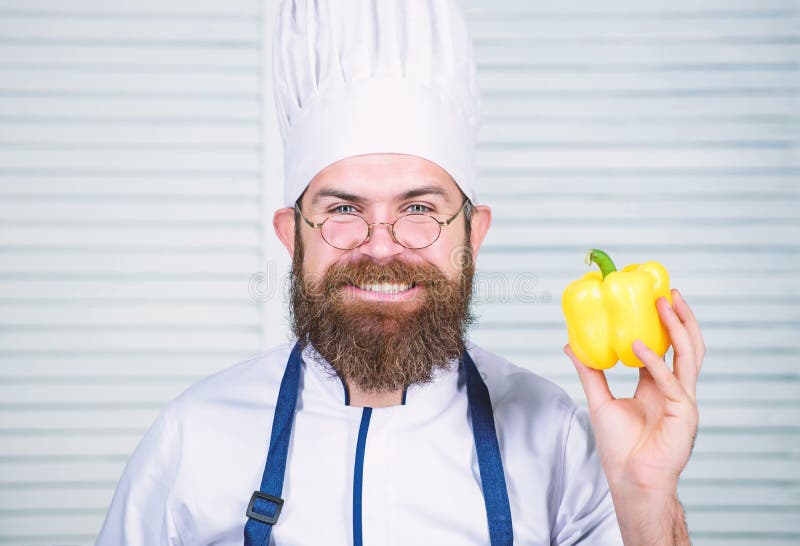 Sweet Pepper. Vegetarian. Mature Chef With Beard. Dieting And Organic