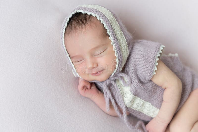 Sweet sleeping newborn baby. Eyes, girl.