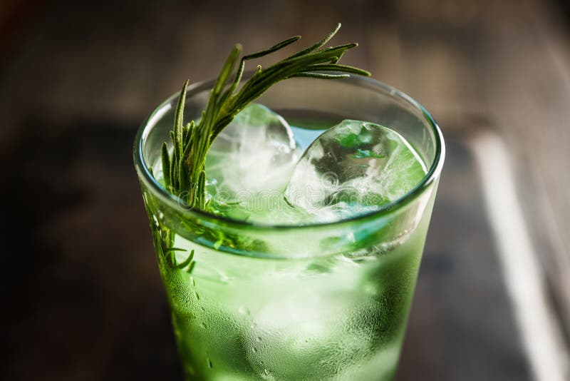 Sweet Tequila Based Green Cocktail with Tarragon and Rosemary Stock ...