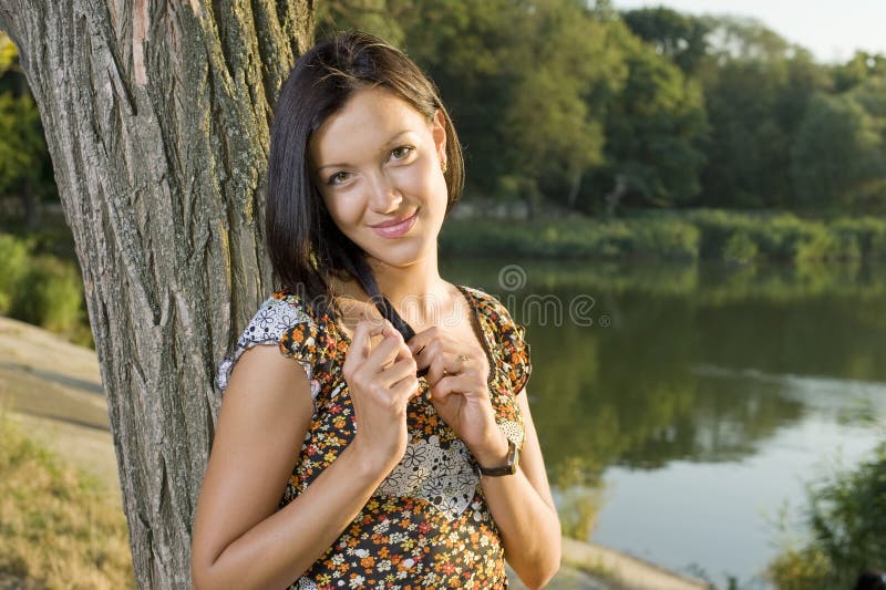 Sweet young woman enjoying at the park