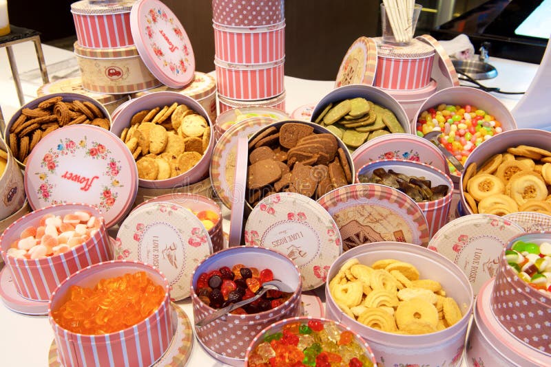 Sweets and cookies in pink boxes