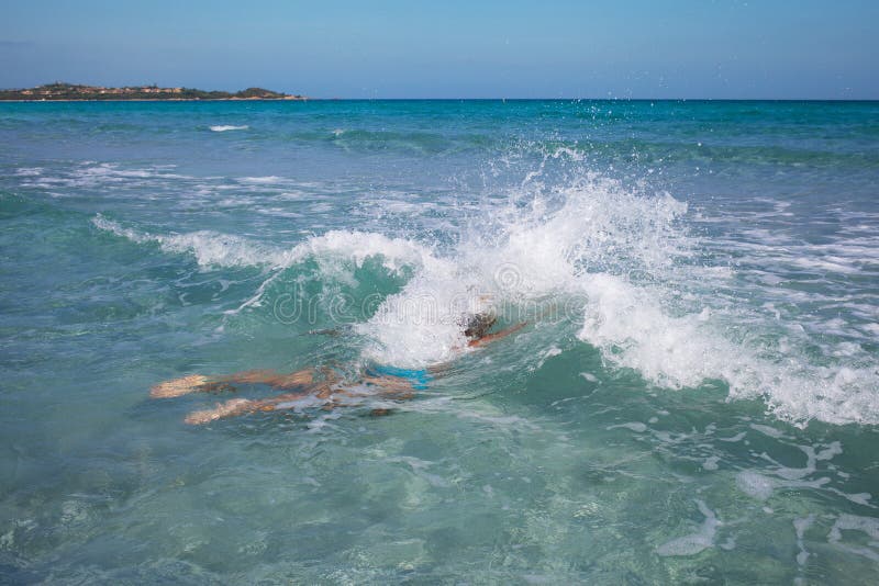 Swimmer in Mediterranean sea. stock image