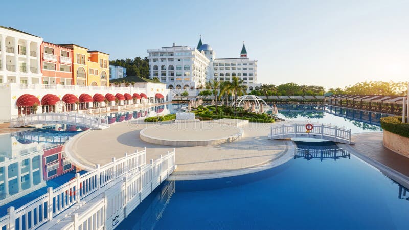 Swimming pool and beach of luxury hotel and outdoor pools and a spa. Amara Dolce Vita Luxury Hotel. Resort. Tekirova