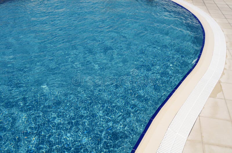 Blue Swimming Pool with Teak Wood Flooring Stock Image - Image of decor ...