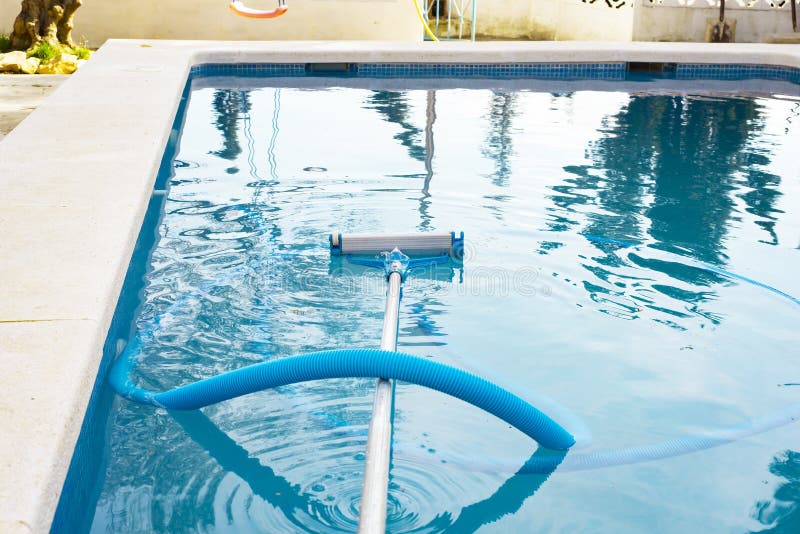 A Swimming Pool without People with a Hose and a Mop a Vacuum Cleaner ...