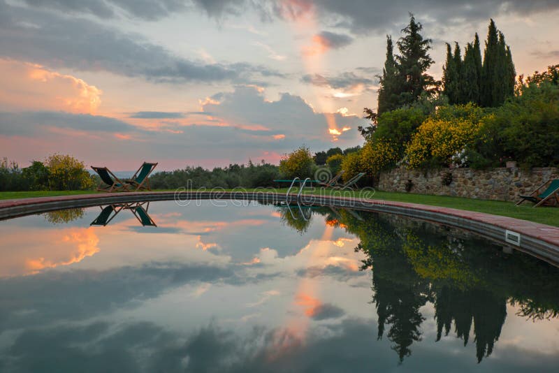 Swimming pool at sunset