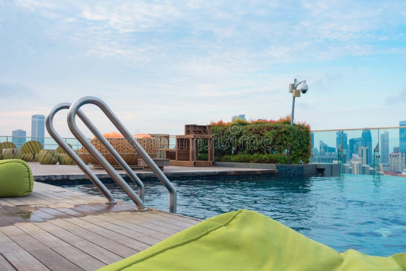 Swimming pool viewed and outdoor bed on the roof floor, Outdoor