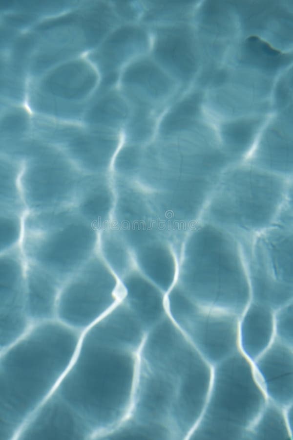 Swimming pool water background royalty free stock photos