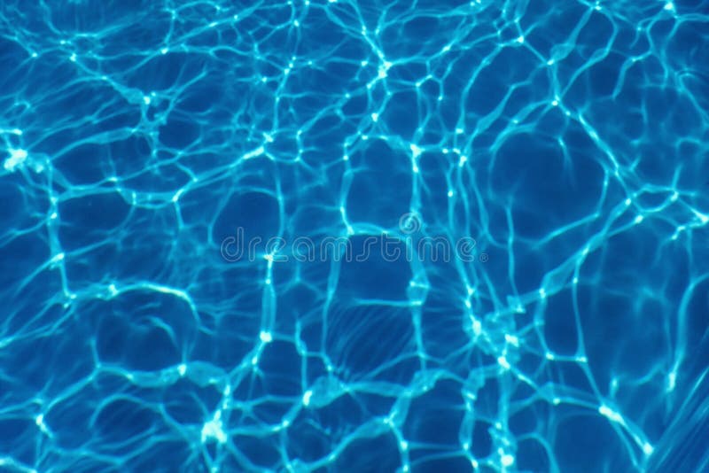 Swimming pool water sun reflection background. Ripple Water