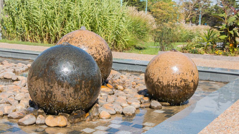 Swimming stone sphere fountains