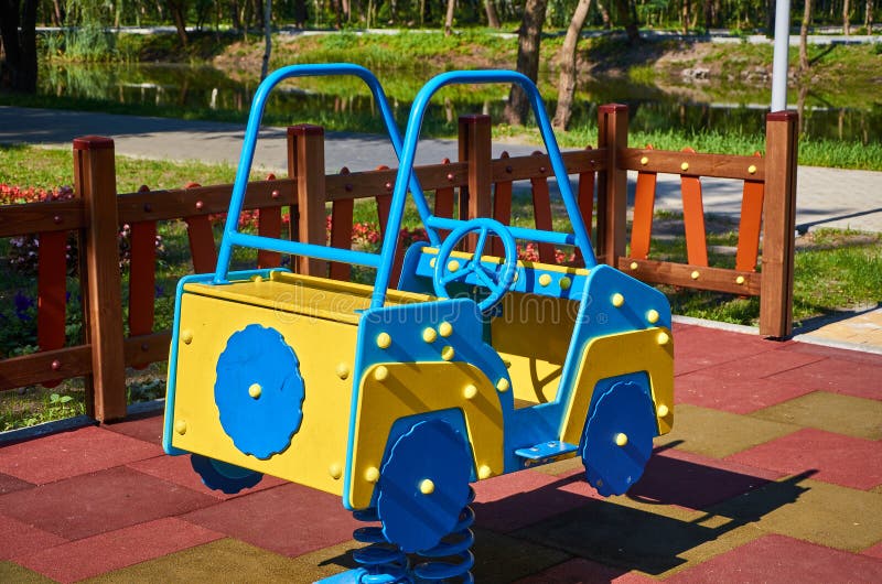 Swing Car for Children in the Public Playground Stock Photo Image of
