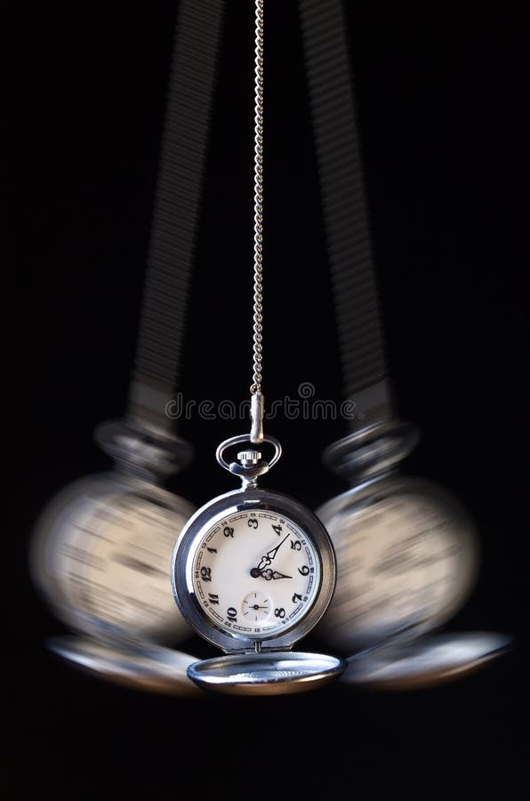 Swinging pocket watch hypnosis on black