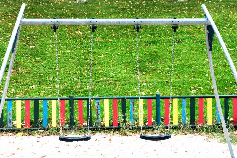 Swings Hanging on Chains in the Playground Stock Image Image of