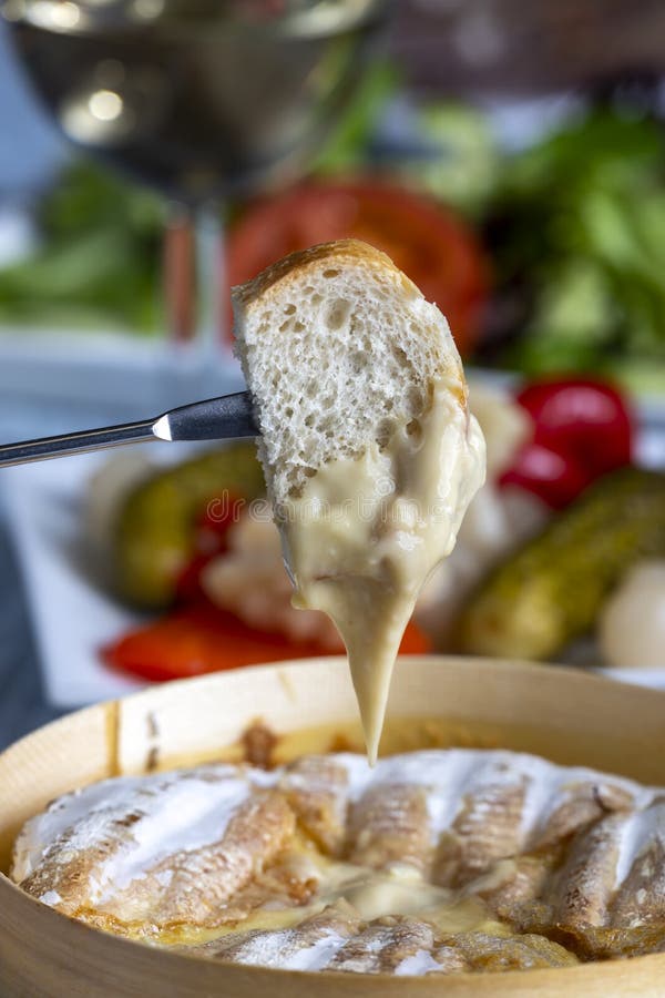 Swiss cheese fondue stock image. Image of dipped, restaurant 176945303