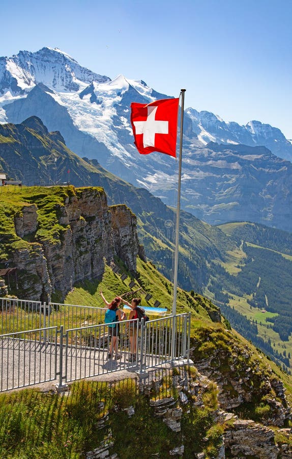 Swiss flag editorial image. Image of mountain, cold - 251637100