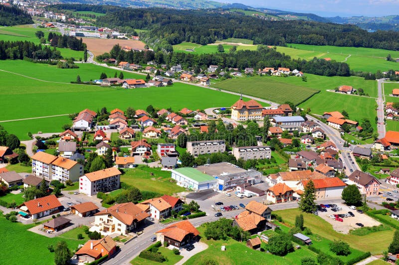 Swiss village stock photo. Image of chalet, green, field 34958094