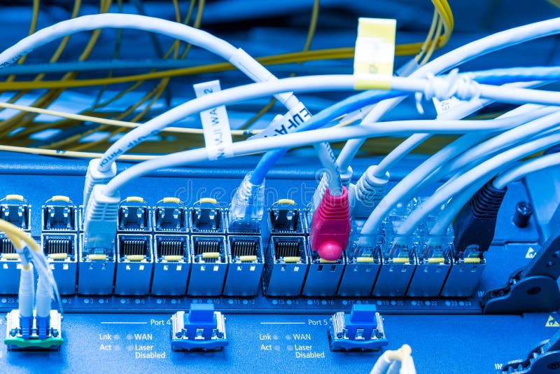 Switch board with connected network cables royalty free stock photo