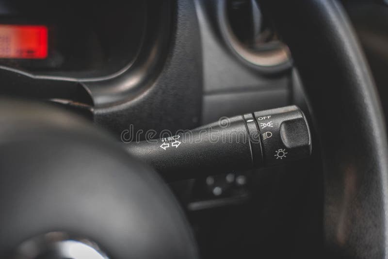 Switch Off Lights in a Car. Closeup Car Integrated Turning Indicator