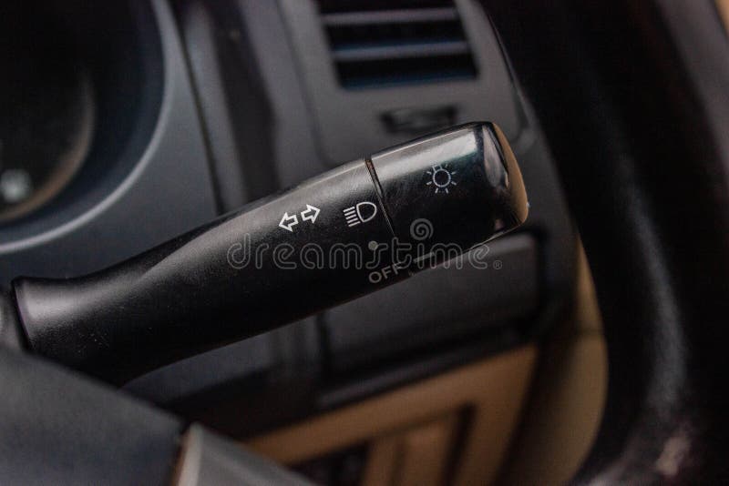 Switch Off Lights in a Car. Closeup Car Integrated Turning Indicator
