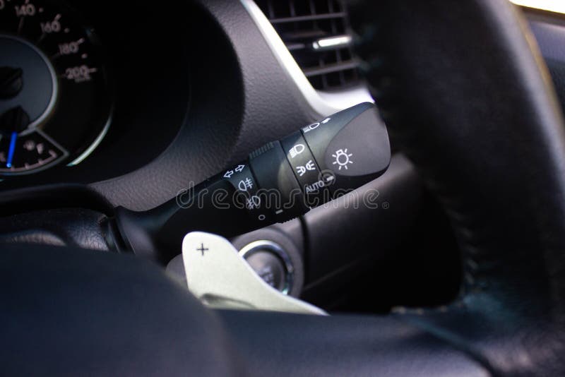 Switch Off Lights in a Car. Closeup Car Integrated Turning Indicator