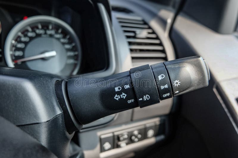 Switch Off Lights in a Car. Closeup Car Integrated Turning Indicator