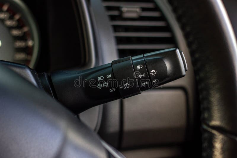 Switch Off Lights in a Car. Closeup Car Integrated Turning Indicator