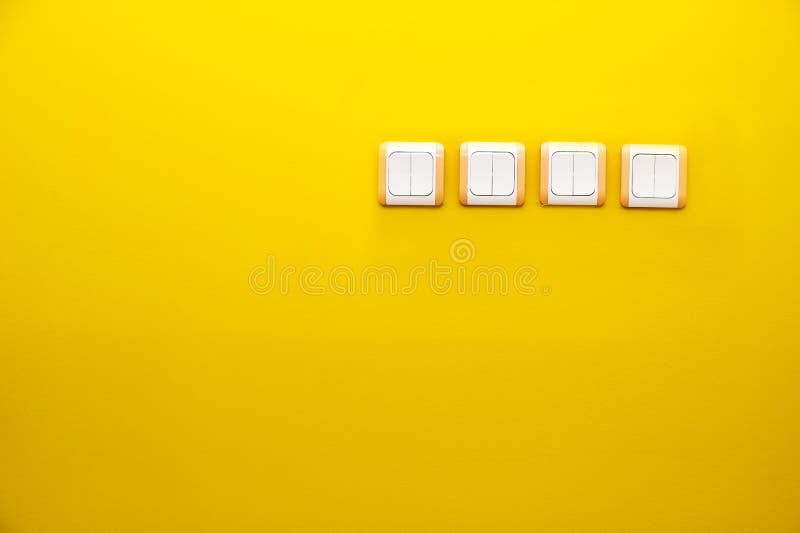 Switches on orange wall. stock photo. Image of concept 40209856
