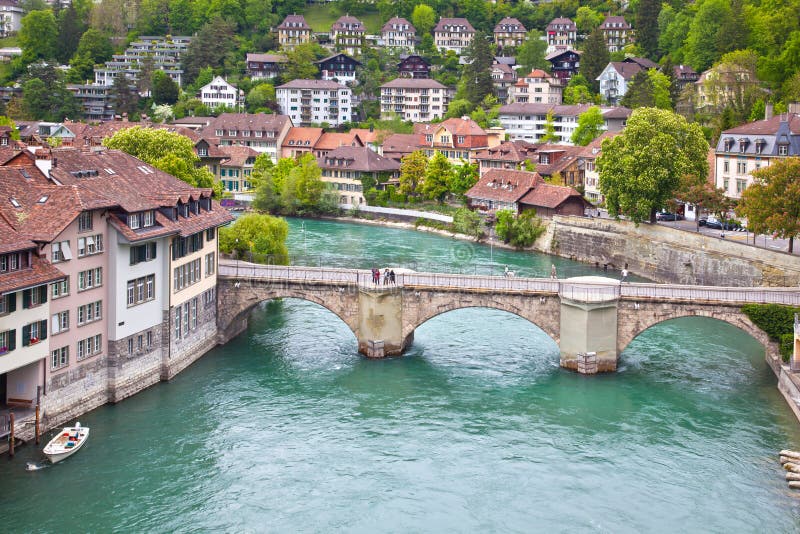 SWITZERLAND, BERN - May 06.2014: House in the historic center of the city. Houses on the river Aare. SWITZERLAND, BERN - May 06.2014: House in the historic center of the city. Houses on the river Aare