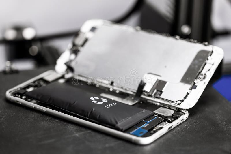 Swollen lithium polymer battery in smartphone, explosive smartphone royalty free stock photo