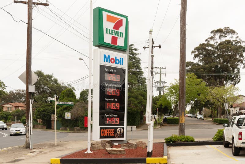 7Eleven petrol station signage with Mobil logo and current fuel prices royalty free stock images 7Eleven petrol station signage with Mobil logo and current fuel prices royalty free stock images