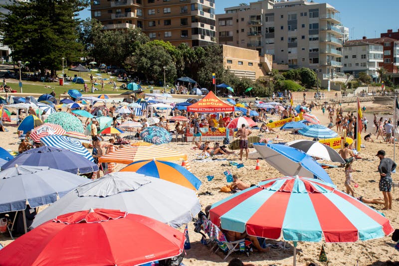 Extremely Overcrowded Cronulla Beach on Australia Day. Umbrellas on the ...