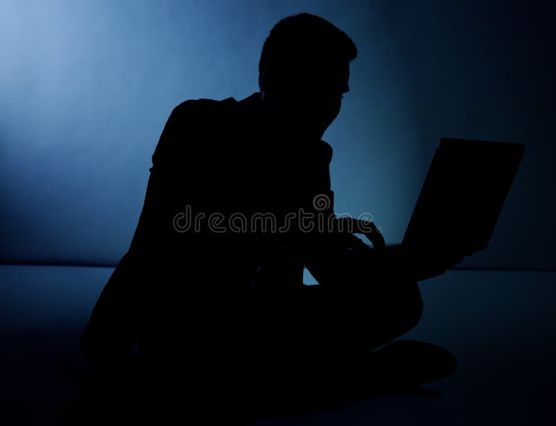 Sylwetka biznesmena działanie. fotografia stock