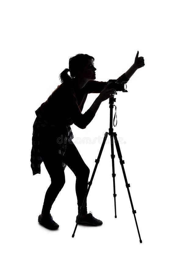 Sylwetka fotografa z kciukami w górę fotografia stock
